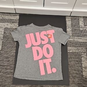 The Nike Tee Kids Gray Tee with Pink 'Just Do It' Graphic